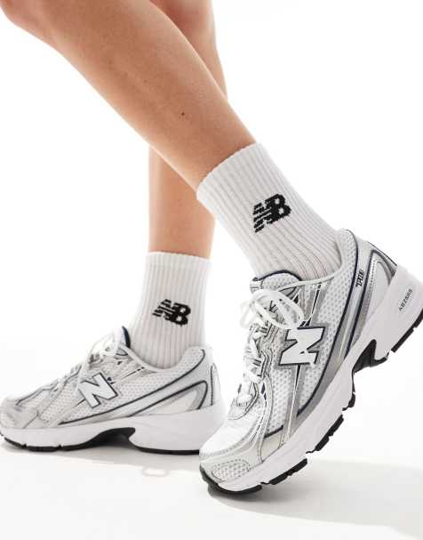 New Balance 740 sneakers in white and navy - view 1