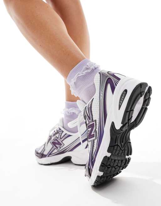 New Balance 740 sneakers in white and purple