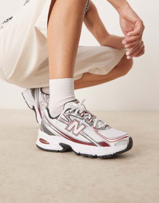 New Balance 740 sneakers in white and red