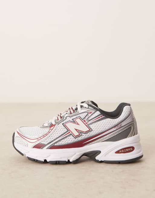 New Balance 740 sneakers in white and red