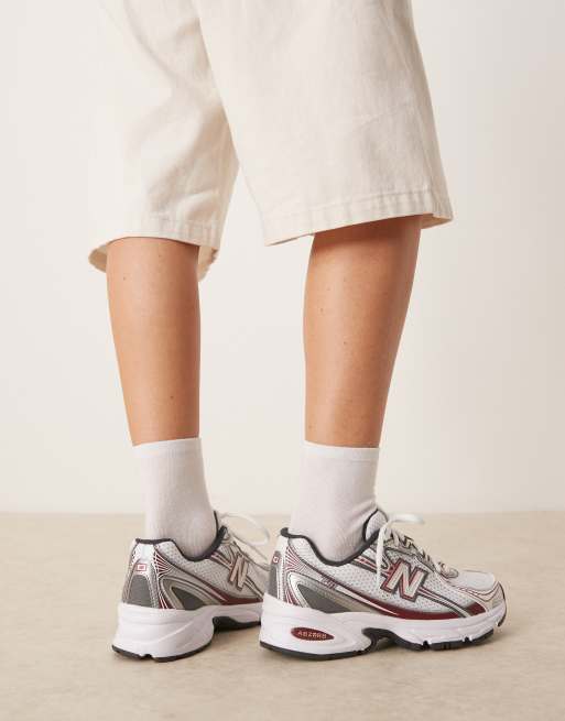 New Balance 740 sneakers in white and red