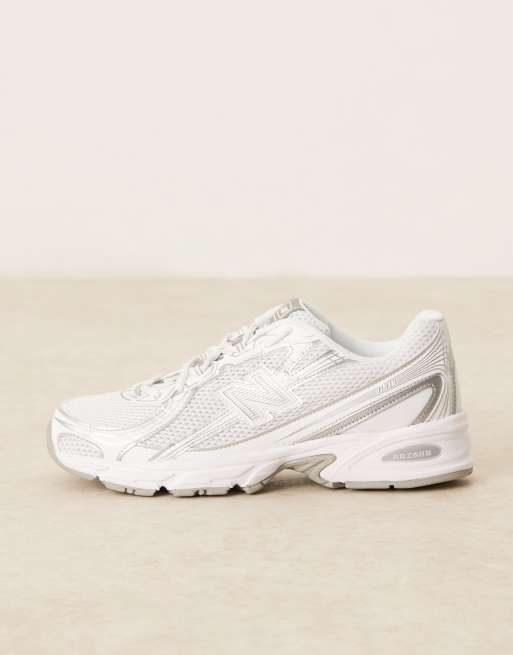 New Balance 740 sneakers in white and silver