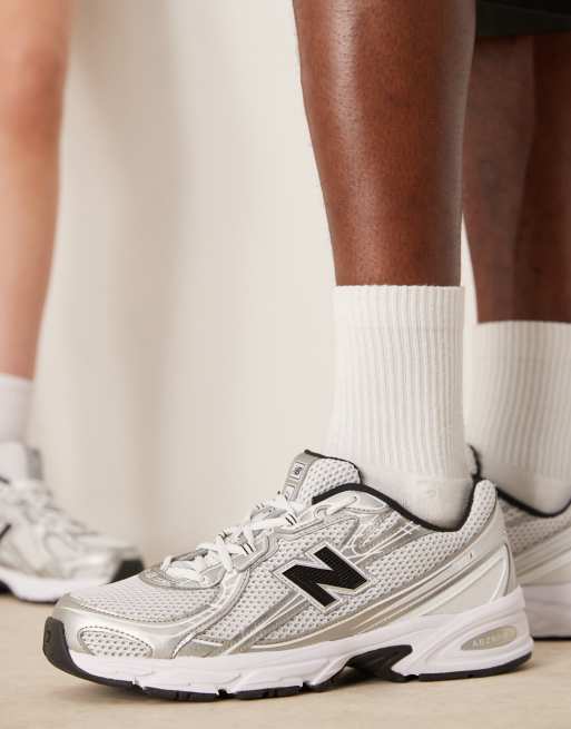 New Balance 740 sneakers in white and silver