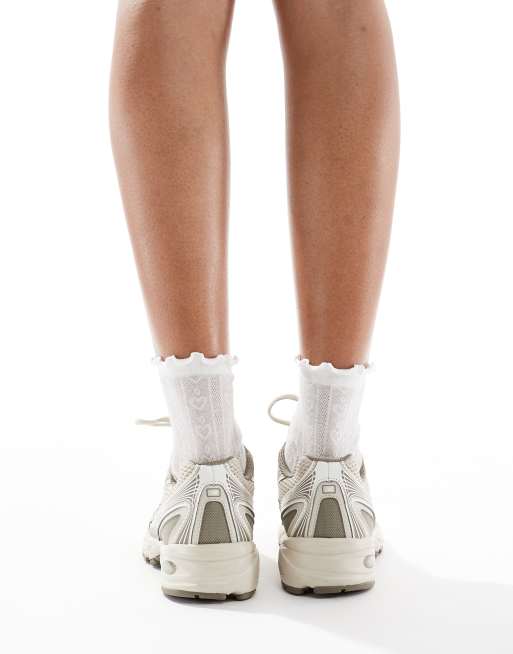 New Balance 740 trainers in beige Exclusive to ASOS