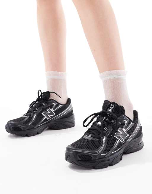 New Balance 740 trainers in black and silver metallic, 4 of 5