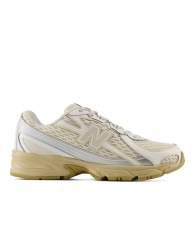 New Balance 740 trainers in off-white