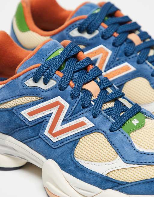New Balance 9060 sneakers in blue and orange multi