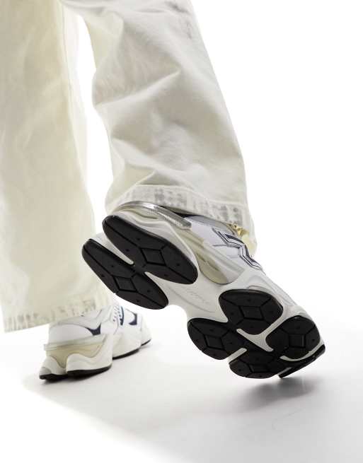 New Balance 9060 sneakers in white with navy detail, 3 of 5