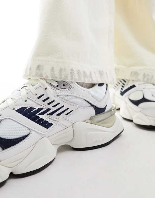 New Balance 9060 sneakers in white with navy detail