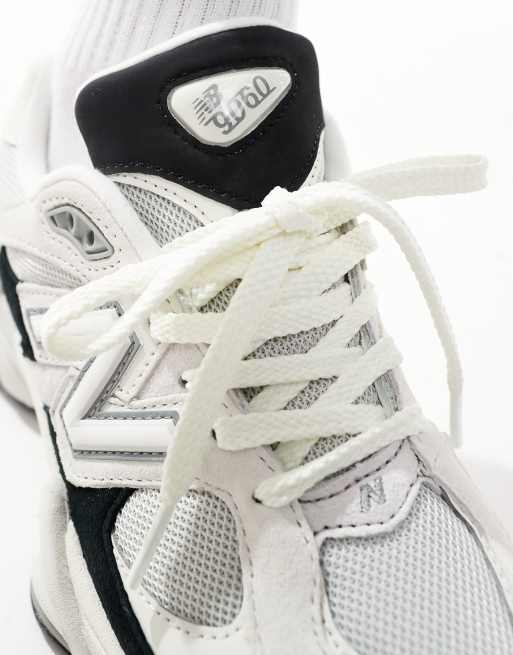 New Balance 9060 trainers in white and black, 3 of 5