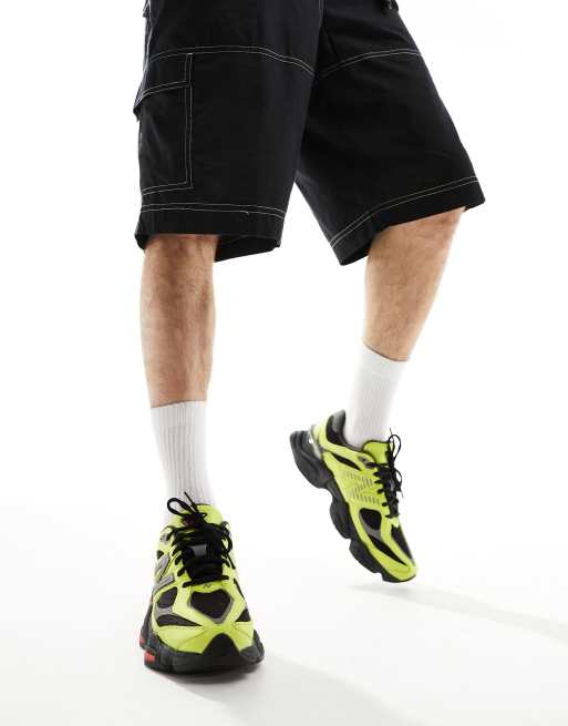 New Balance 9060 trainers in yellow, 4 of 5