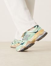 New Balance 9060 sneakers in blue and orange multi