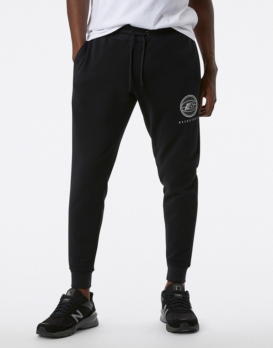 New Balance Active Tapered Fit Logo Trackpants In Black