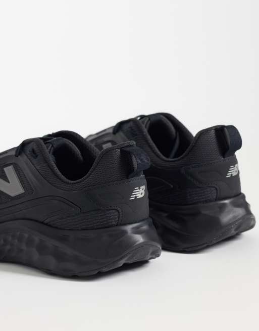 New Balance Arishi running trainers in black, 2 of 5
