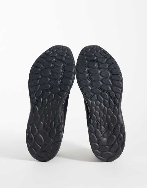 New Balance Arishi running trainers in black, 5 of 5