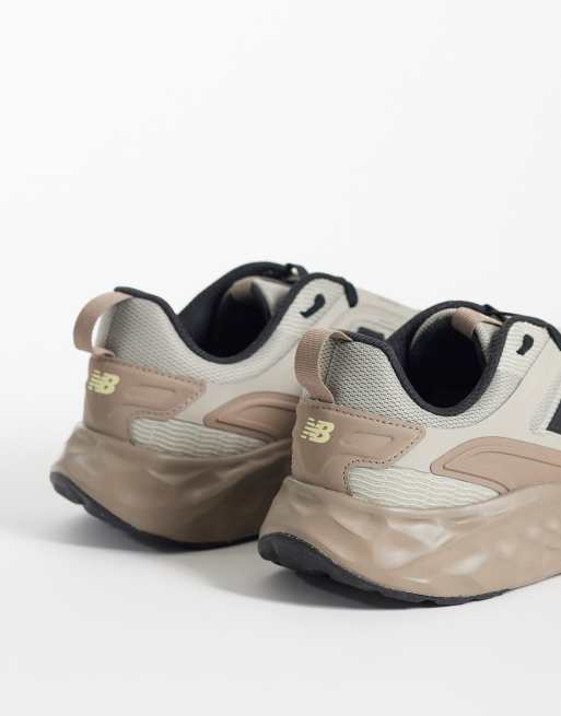 New Balance Arishi running trainers in brown, 2 of 5