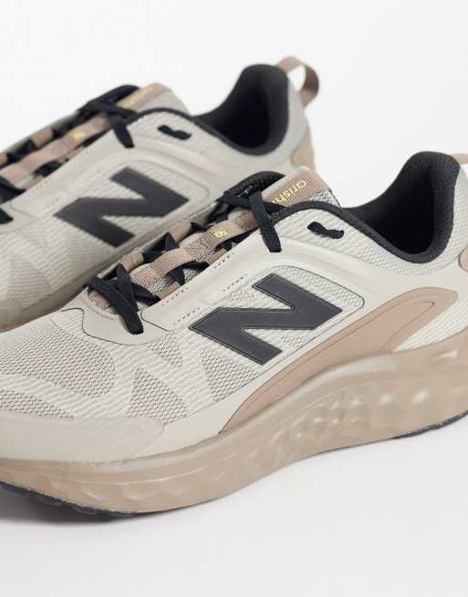 New Balance Arishi running trainers in brown, 4 of 5
