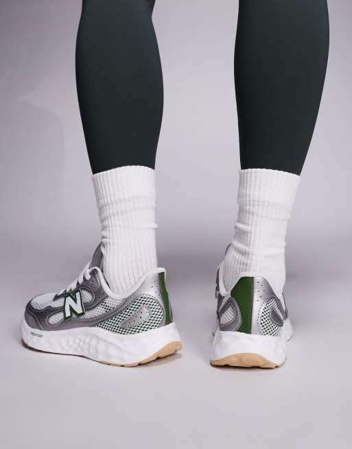 New Balance Arishi running trainers in silver and green, 4 of 5