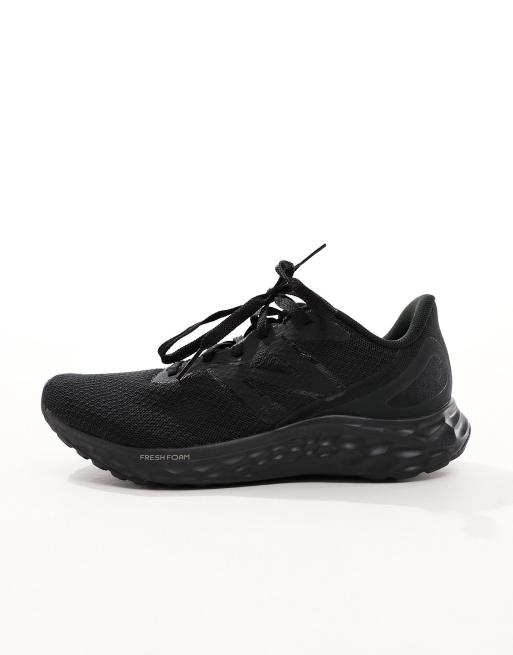 New Balance Arishi running trainers in triple black