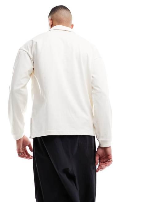 New Balance – Athletics – Langärmliges Polohemd in Beige mit linearem Logo, 4 von 4