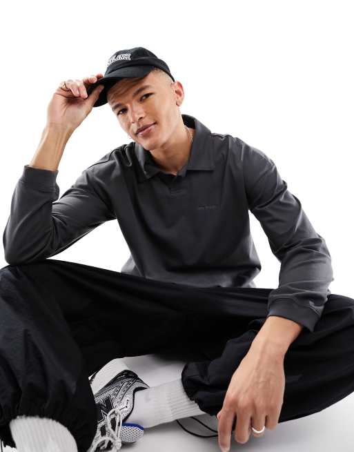 New Balance - Athletics Linear - Polo met lange mouwen in zwart