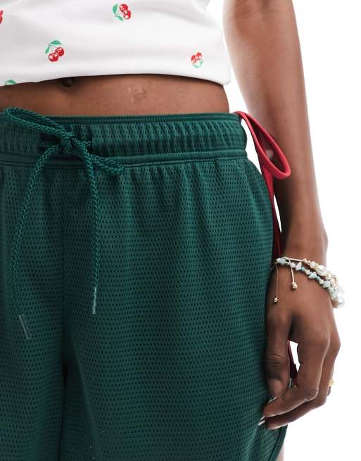 New Balance – Athletics – Netzstoff-Shorts in Grün, 4 von 5