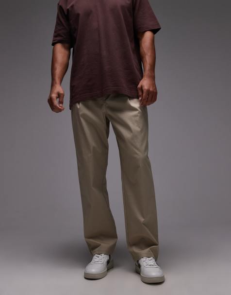 New Balance - Athletics - Ruimvallende broek in stoneware - view 1