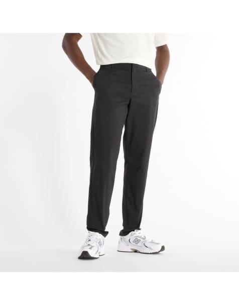 New Balance – Athletics – Schmal zulaufende Hose in Schwarz, 32 Zoll Schrittlänge - view 1