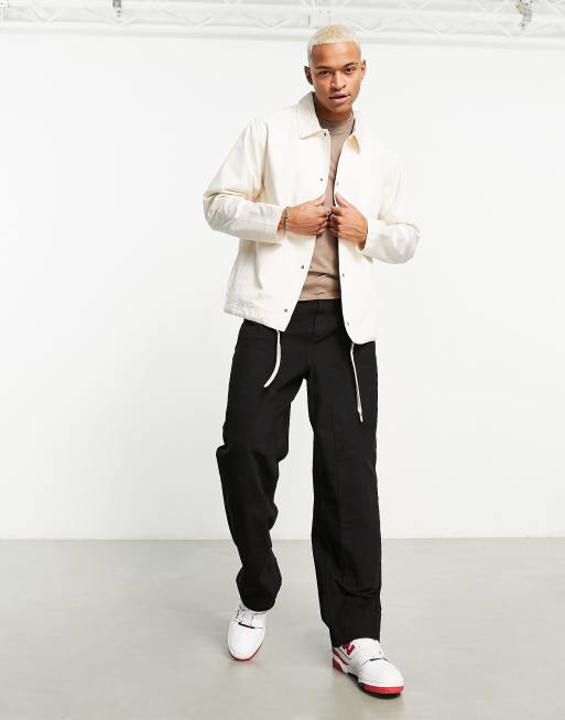 New Balance Athletics State Coaches Jacket in off white | ASOS