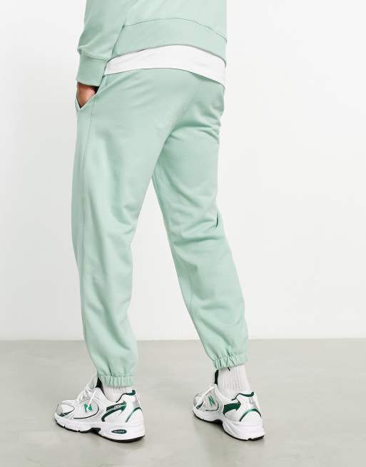 Light store green sweatpants