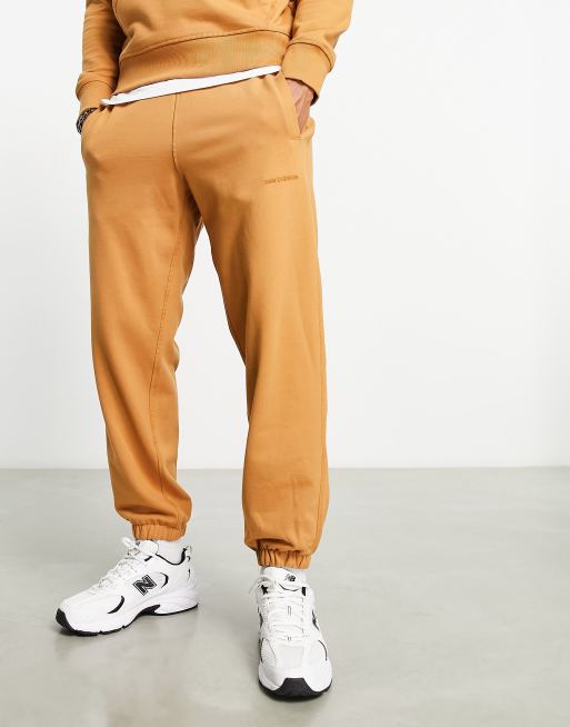 New balance best sale tapered pants