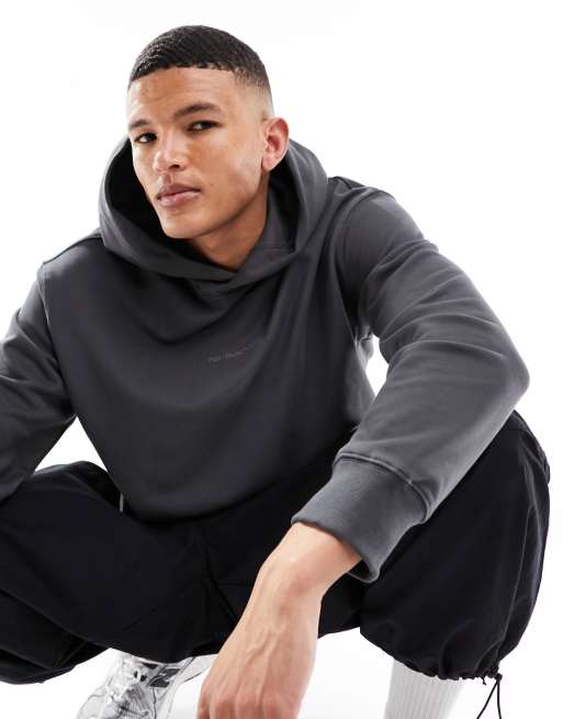 New Balance - Athletics - Top in pile nero con logo lineare