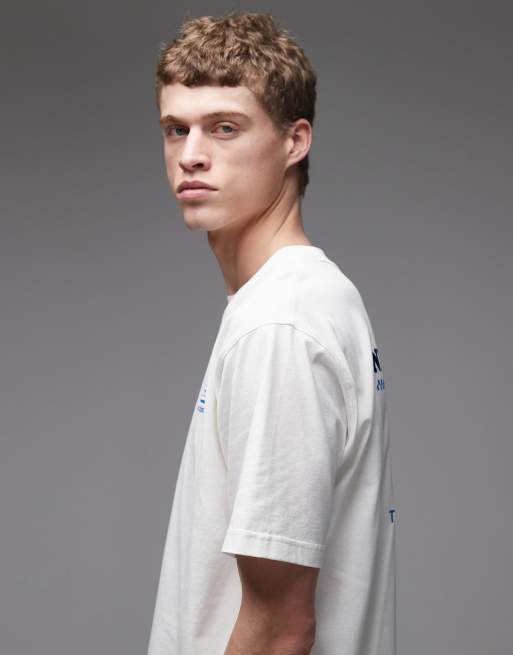 New Balance – Biały T-shirt z grafiką „Fish and Chips“, 4 z 5
