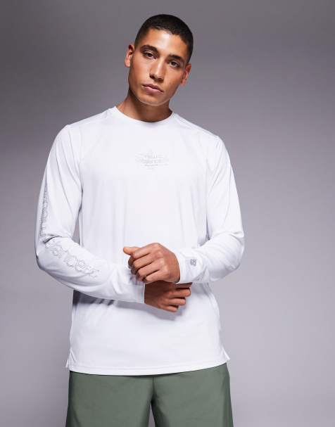 New Balance – Biały T-shirt z poliestru z długimi rękawami i odblaskowymi detalami - view 1