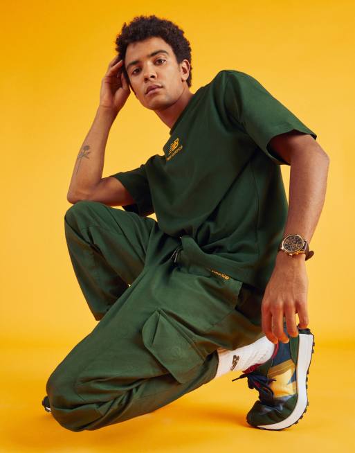 New Balance cargo pants in green exclusive to ASOS