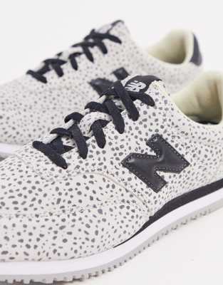 white animal print trainers