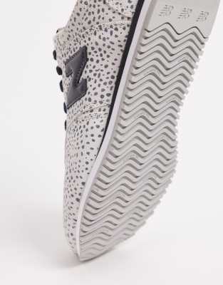 white animal print trainers