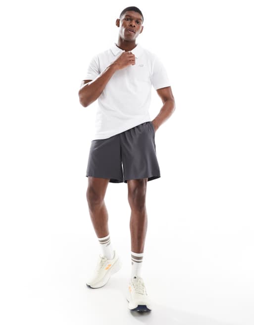 New Balance Cotton pique polo in white ASOS