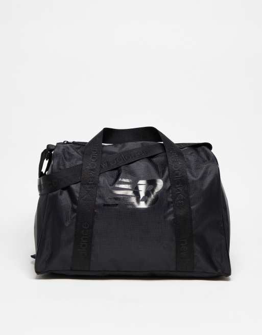 New Balance duffel bag in black ASOS