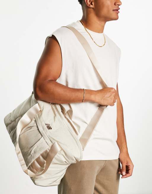 Beige duffle bag hot sale