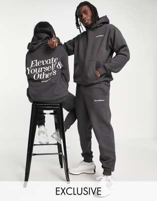 New Balance – Elevate Yourself – Svart huvtröja i unisex-modell