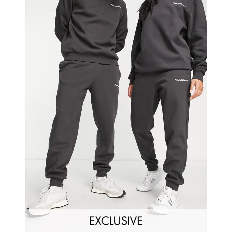 New Balance Running joggers with logo taping in black, ASOS