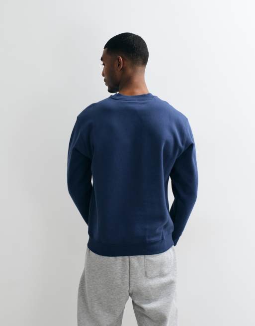 New Balance essential fleecesweatshirt in marineblauw, 3 van 5