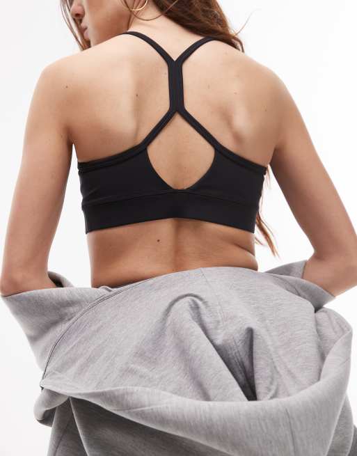 New Balance essential sports bra in black, 3 of 4