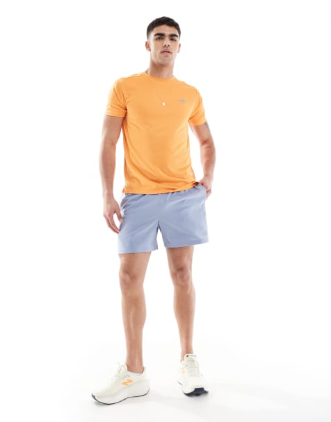 New Balance essentials 5 inch shorts in blue - view 1