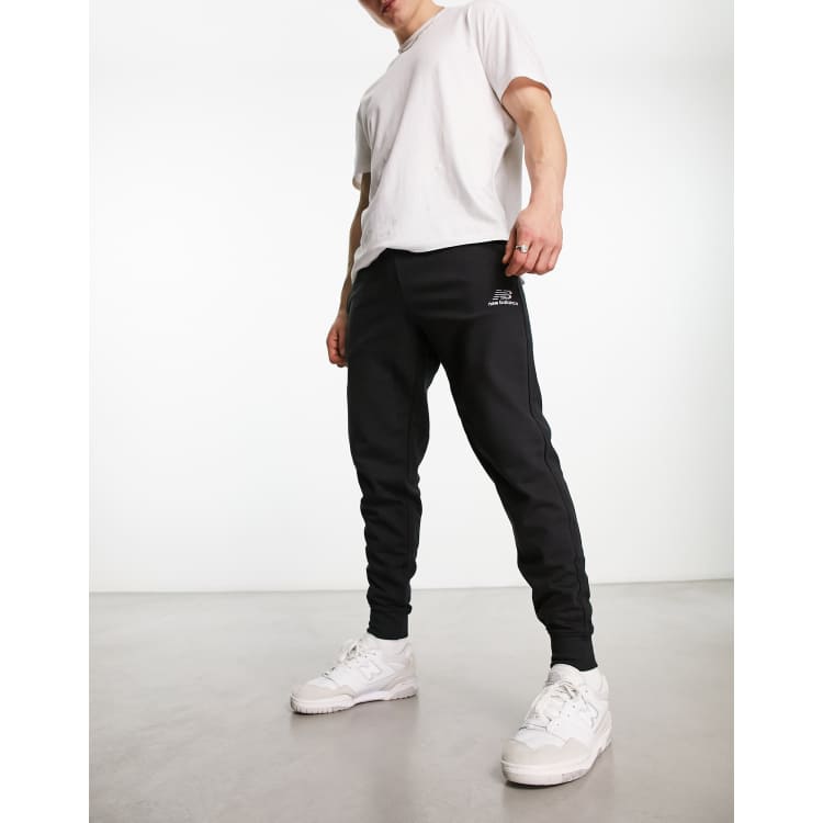 New Balance Essentials in embroidered black sweatpants ASOS 