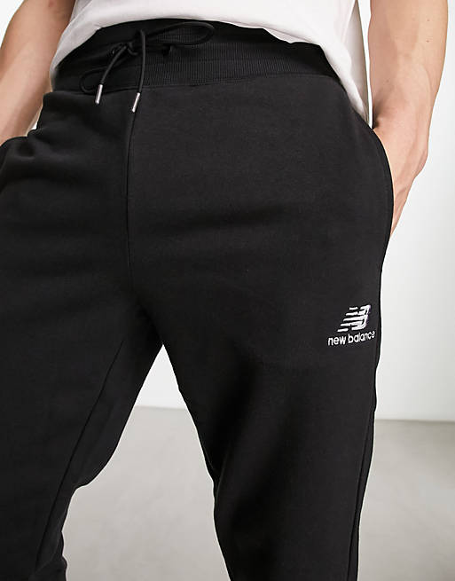 New Balance Essentials embroidered sweatpants in black | ASOS