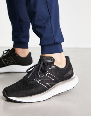 New Balance EVOZ trainers in black and white - ASOS Price Checker