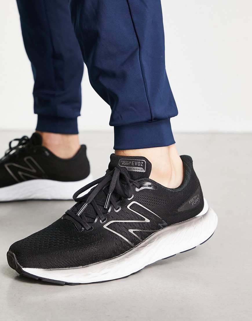 New Balance EVOZ running trainers in black and white