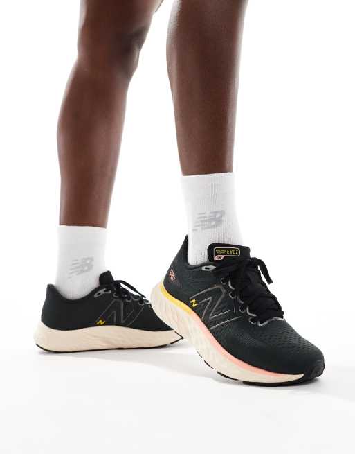 New Balance - Evoz - Sneakers da corsa color nero e rosa